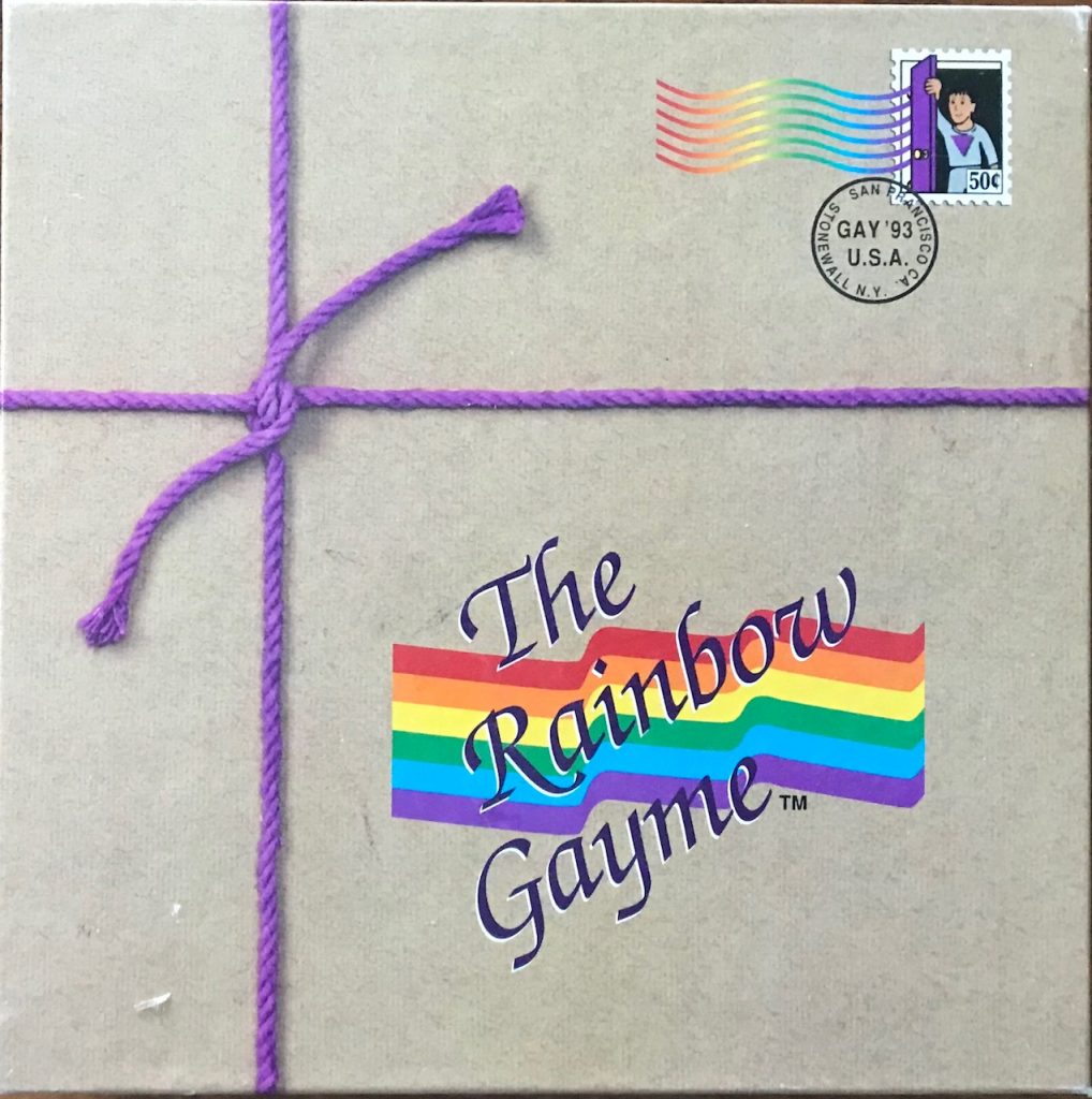 Cover looks like a package with purple yarn and the title The Rainbow Gayme