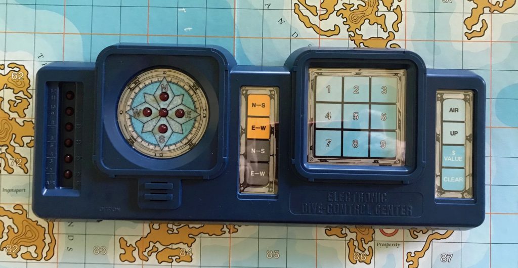 The dive control center has a compass on the left area, a grid on the right, and a couple of other button columns