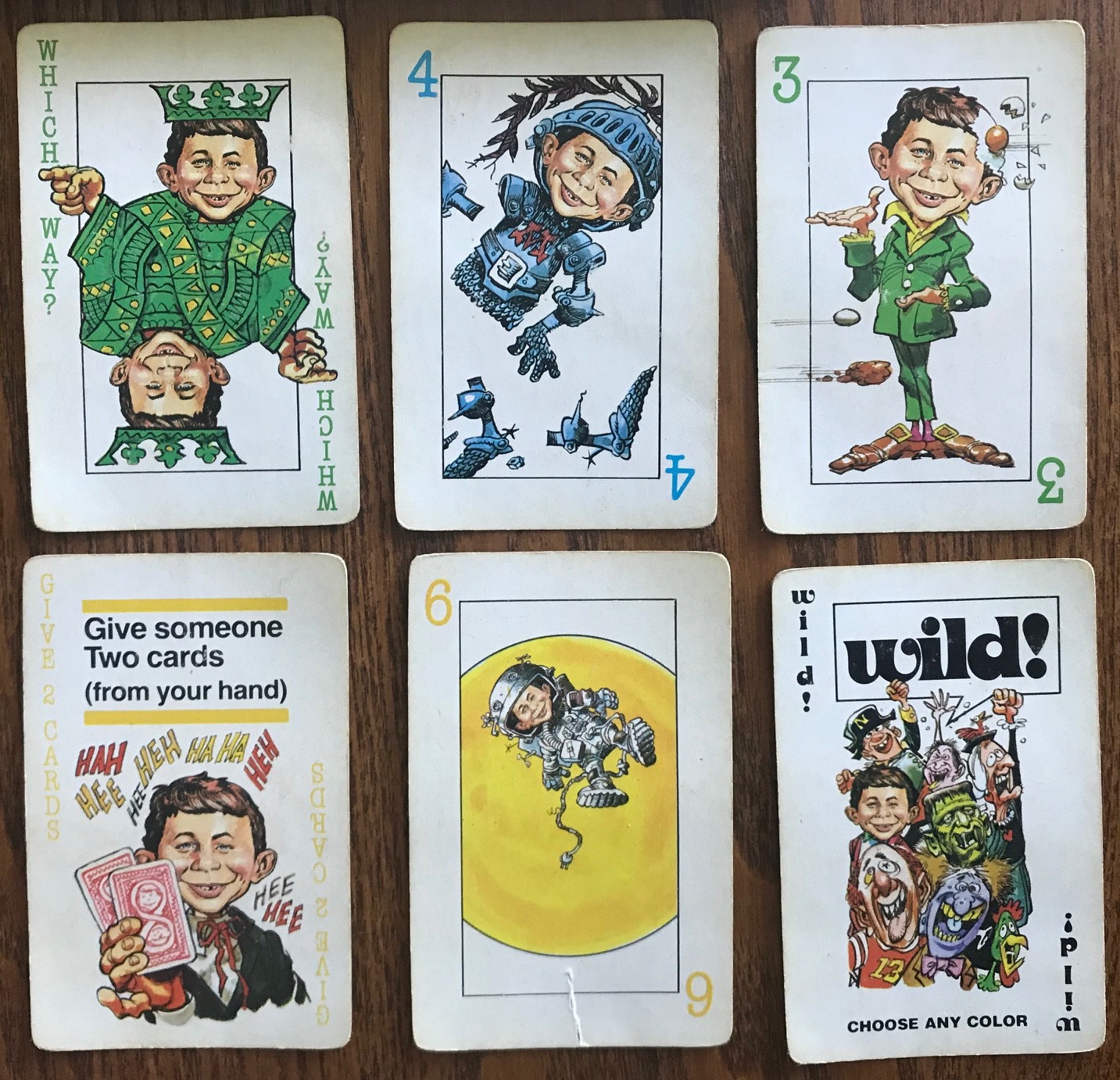 Miscellaneous cards showing a Wild, a green 3, a blue 4, a yellow 6, a Which Way