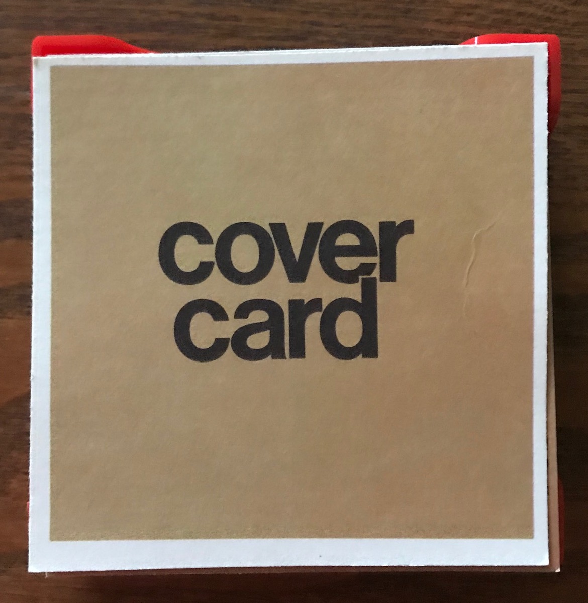 The tan card says Cover Card on top
