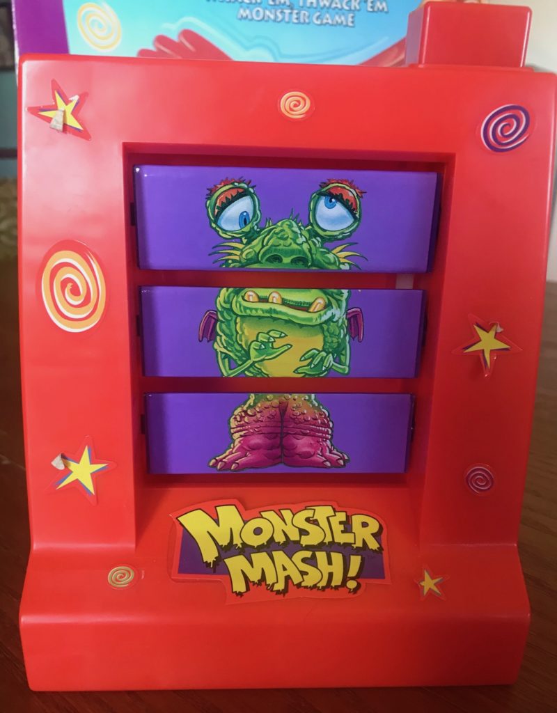 The monster machine with a large button at the top that you press, and the three sections randomize into a monster