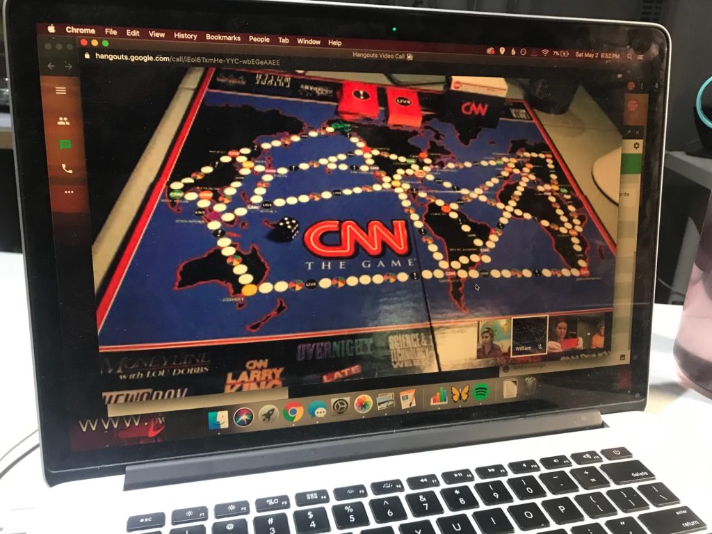The laptop showing the game board during our play
